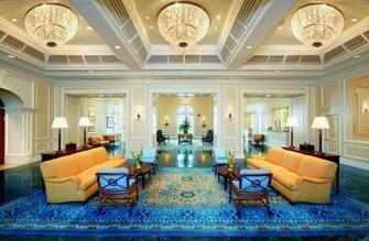 Yellow Sofas Chandeliers Blue Carpet Wallpaper