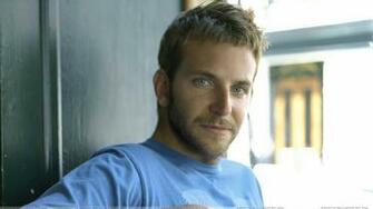Bradley Cooper In Blue T Shirt Looking At Camera Wallpaper