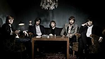 Five Man Group Band Sitting On Couch And Armchairs HD Wallpaper
