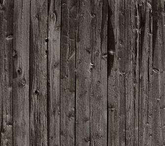 Barboard Weathered To A Charcoal Shade With Knots And Spaces