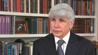 Rod Blagojevich In Front Of Bookshelf Wallpaper