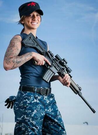The Bad Ass Chick Who Taught Rihanna To Shoot In