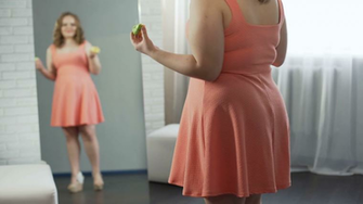 Fat Girl Eating Sweet Donuts In Front Of Mirror Totally Satisfied