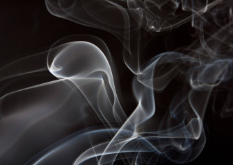 White Volatile Substance On Black Wallpaper