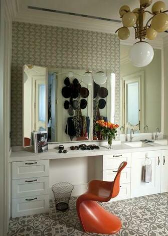 Bathroom Features Walls Clad In Green And Beige Patterned Wallpaper