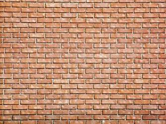 Brick Wall Of Light Red Bricks Suitable For A Background Or Matte