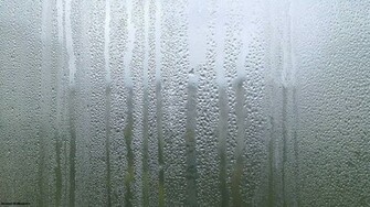 Rain Outside The Window And Drops Of Water Drips On
