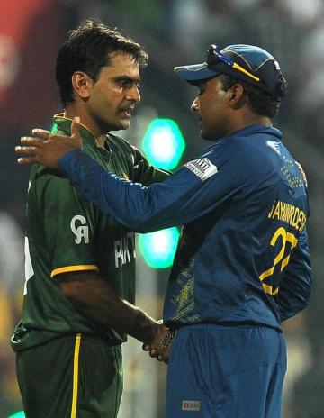 Mahela Jayawardene And Mohammad Hafeez Shake Hands Photo Icc