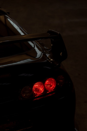 Black Car With Red Light Photo Image