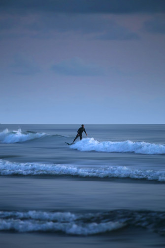 Person Surfing On Sea Waves During Daytime Photo Cannon
