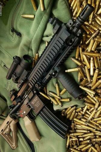 Gun And A Large Number Of Bullets iPhone Wallpaper Background