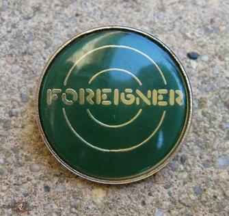 Foreigner Logo Vintage Crystal Enameled Badge Green Background