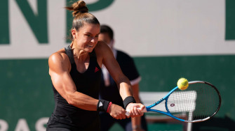 Maria Sakkari Flexing Biceps Wallpaper