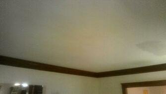 Skim Coating Ceiling In Renovation