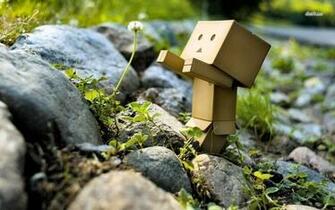 Boxman Reaching For Flower Wallpaper Artistic