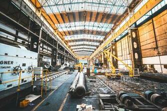 White Generator Set Near Industrial Machines Stock Photo
