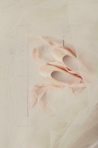 Pink Ballet Pointe Shoes And Tutu On White Wood Background Stock