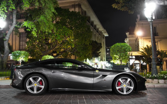 Side Of A Black Ferrari F12 Berlinetta Wallpaper Car
