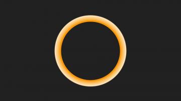 Orange Circle On Black Wallpaper