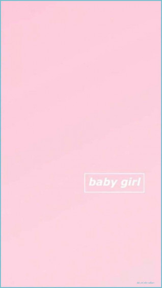 A Baby Girl Dressed In Pink Showing Off Her Sweet Smile Wallpaper