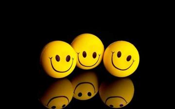 Smiley Balls On Black Funny Wallpaper HD