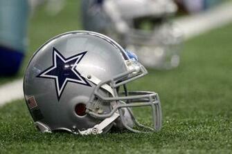 Dallas Cowboys Helmet Sits On The Field Before An Nfl Football Game