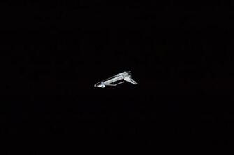 Speck In A Sea Of Blackness Wallpaper