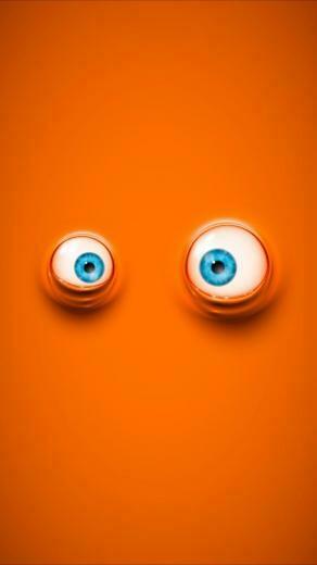 Cool Cartoon Eyes On Orange Background Wallpaper For iPhone