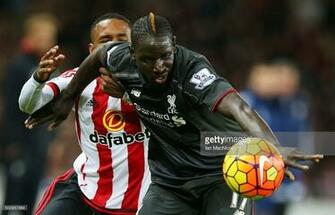 Mamadou Sakho Of Liverpool Vies With Sunderland S Jermain Defoe