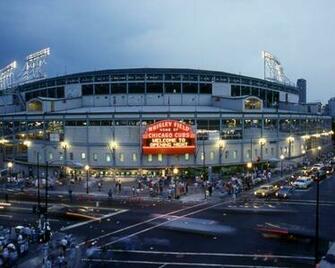 Background Chicago Cubs First Night Game At Wrigley Field