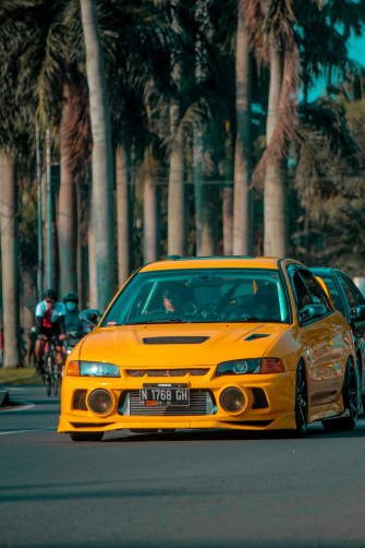 Yellow Porsche On Road During Daytime Photo Speed Image