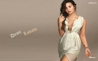 Demi Lovato In White Maxim Sizzling Wallpaper