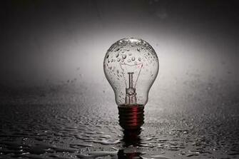 Incandescent Bulb With Droplets HD Wallpaper