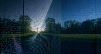 Washington Monument Reflected In The Vietnam Veterans Memorial Wall