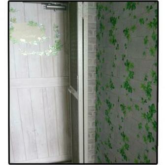 Ivy Gray Brick Self Adhesive Wallpaper The Man Is Putting Up