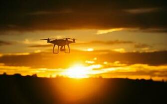 Wallpaper Quadrocopter Sunset Sky Flight