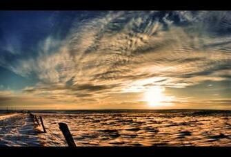 Snowy Sunset Wallpaper By