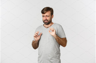 Portrait Of Timid And Scared Man In Wallpaper