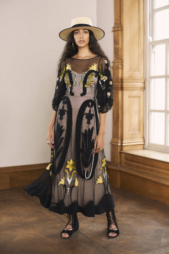 Model Portraying Timeless Fashion In A Temperley London Black Wallpaper