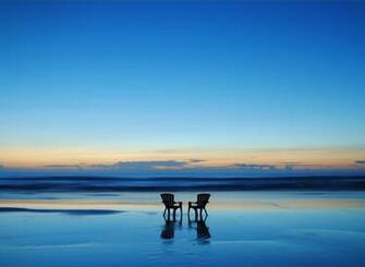 Beach Chairs For Couple At Sunset Android Wallpaper