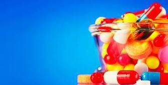 Stock Footage Pills And Tablets Rotating On Blue Pack