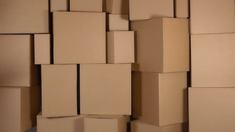 Beautiful Female Warehouse Worker In Orange Uniform Searching Item