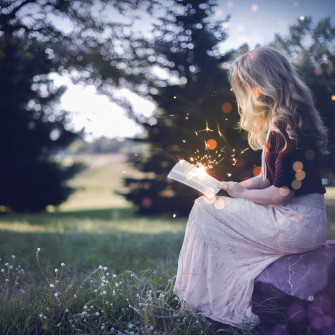 Girl Reading A Book Wallpaper