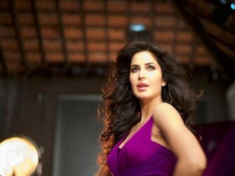 Beautiful Katrina Kaif In Purple Dress Movie Wallpaper