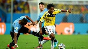 Colombia S Juan Cuadrado Dribbles Past Uruguay Alvaro Pereira