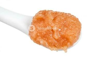 Salty Caviar Of Alaska Pollock In Ceramic Spoon Close Up Isolated