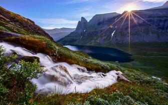 Sunlit Mountain Waterfall Wallpaper