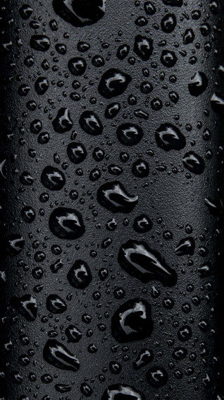 Stylish Black iPhone Against A White Background Wallpaper