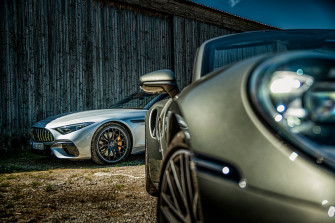 Mercedes Amg Sl63 Vs Porsche Turbo Cabriolet Twin Test Re