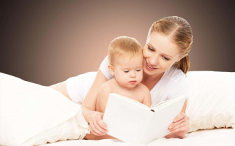 Mother Reading A Book To Baby Picture Wallpaper